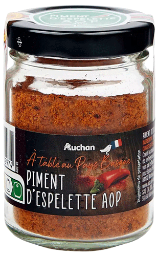 bocal de piment d'Espelette et son étiquette avec photo culinaire de piment frais