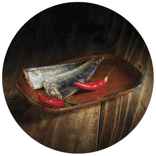 sardines à l'huile avec piment pour illustrer l'emballage des sardines à l'huile et au piment de la gamme terroir Auchan